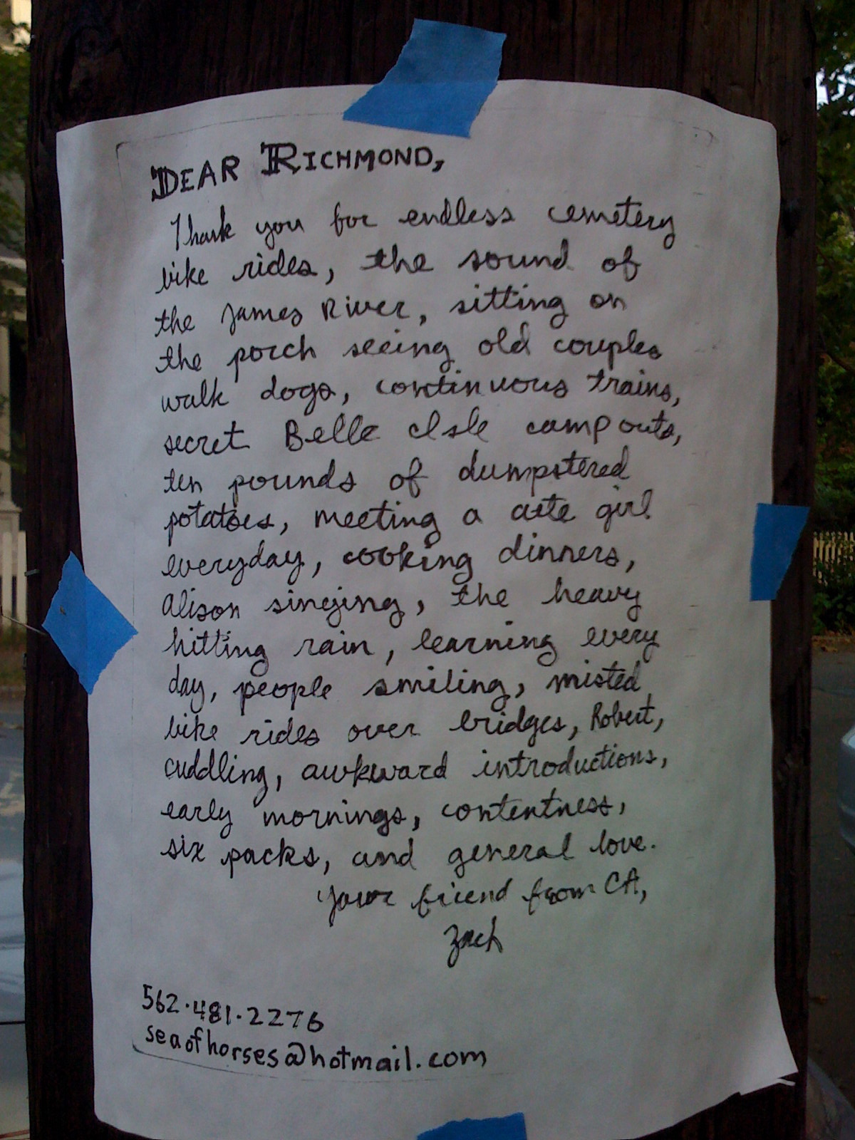 letter on telephone pole on Pine Street