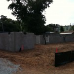 Front sidewalk view of Phase 2 foundations